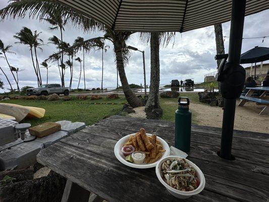 Fish and chips; poke bowl; view from seating area.