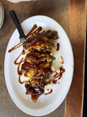 Mile high meatloaf. Served over mashed potatoes, seems the potatoes is considered the side as well??