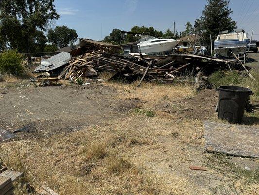 Lot clean up of collapse shed before