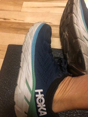 Hokas happier working inside at the gym than pounding scorching hot pavement outside