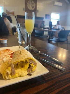 Breakfast burrito w/mimosa , delicious 10/10