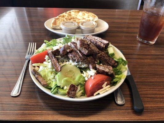 Athenian Balsamic Grilled Steak salad with side of pita.