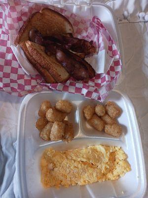 Breakfast platter-Bacon, eggs, hashbrowns and toast.