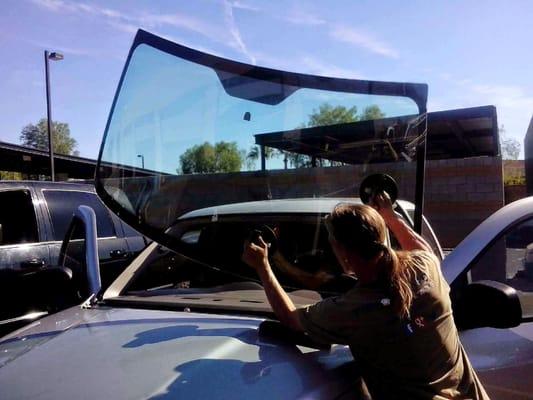 Setting a large windshield.