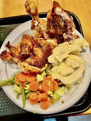 Half of the Peruvian chicken with a side of mashed potatoes and steamed veggies - YUMMY!!!