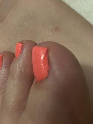 Uneven, missing I corners, and the top coat isn't going all the way to the edges. Can you see the creasing?