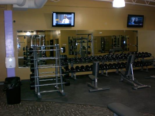 Complete free weight room with squat rack, smith machine, kettlebells, plenty of benches