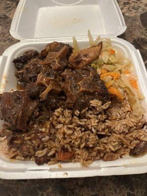 Large Oxtails served with Rice and Peas,Cabbage,and Plantains