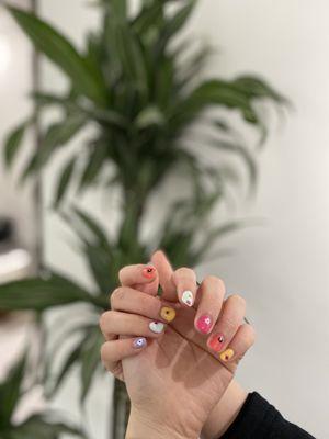 Colorful gel colors and cute nails design done by Ivy