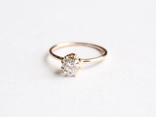 Victorian rose gold solitaire ring with .75 carat old mine cut diamond - our favorite cut!