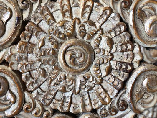 Hand carved wood armoire detail