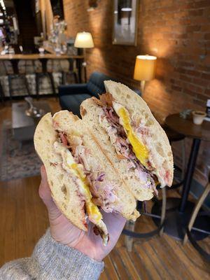 The Zimmy - an egg, brie, nutty slaw, and bacon sandwich on ciabatta