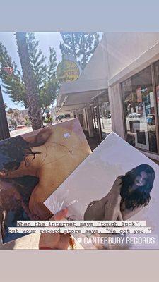 Photo of Harry Styles by Harry Styles and Revival by Selena Gomez. Both vinyls, in front of Canterbury Records.