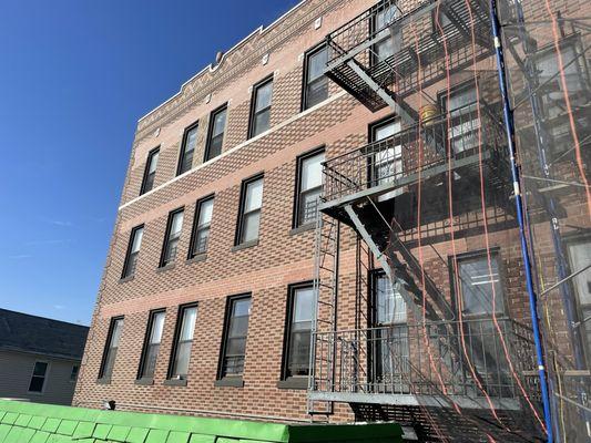 Brick Building being repaired.