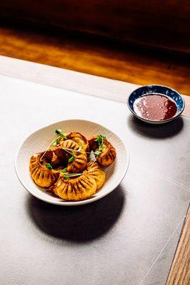 fried nepali style chicken dumpling. pair this with a sweet chilli.