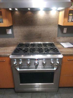 This is the range that they went with. Granite cuts, and cabinet cuts and move electrical and move gas line.