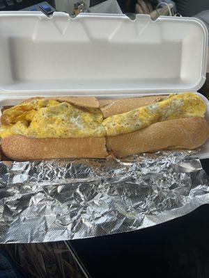 Sausage,egg,cooper sharp on a long roll