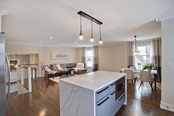 White Marble countertops with Shaker Gray cabinets for a modern kitchen remodel