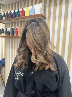 Brunette highlights and root shadow