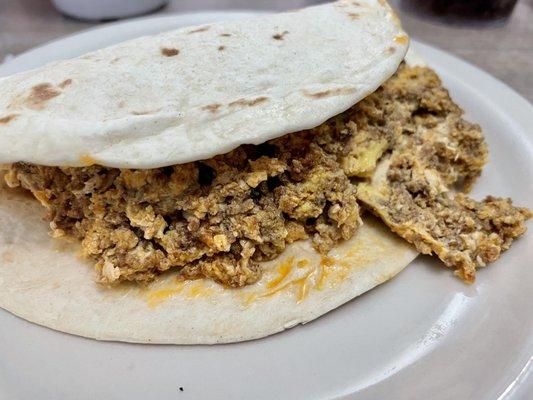 Egg and chorizo breakfast taco with flour tortilla