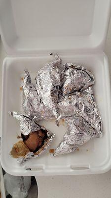 Foil wrapped chicken.   It has sauce inside.