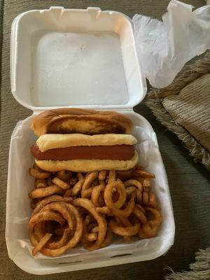 A hot dog with a extra bun and curly fries