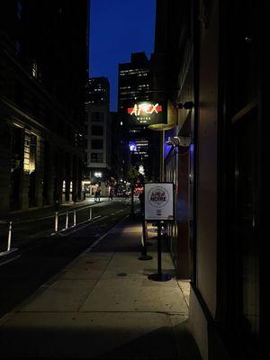 Front of shop at night