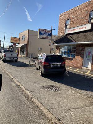 Mike and Emma's Sandwich Shop, storefront, far left