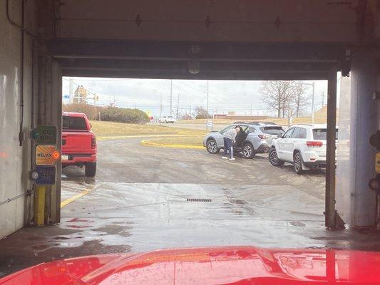 People drying off their own cars