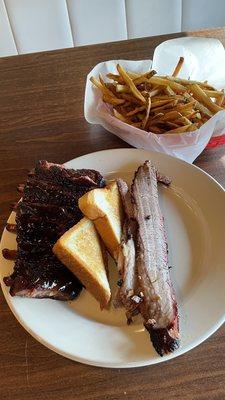 This is one of the combo plates for I believe $22. The ribs and the fries were outstanding. That's actually three slabs of brisket.