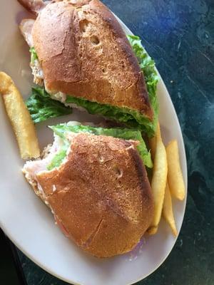 Half a turkey poboy with a few fries borrowed from my husband's plate.