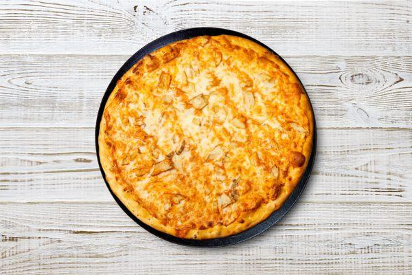 Ignite your taste buds with our Buffalo Chicken Pizza. Spicy buffalo sauce, grilled chicken, and melty mozzarella combine for a fiery flavor