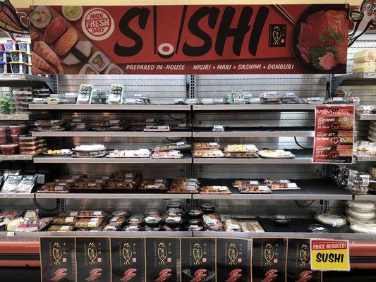 New sushi display next to hot plate lunch area!