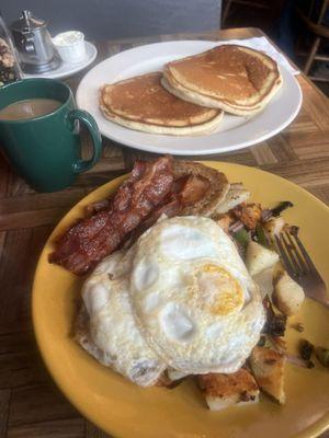 Bucker's Plate, eggs over medium, extra crispy home fries. Self-serve coffee.