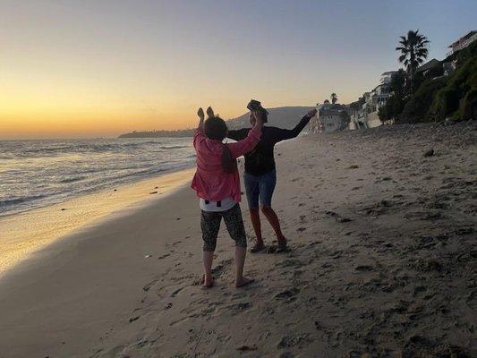 Me and a random strangers dancing with joy on thr sands of Laguna Beach....life is good folks.