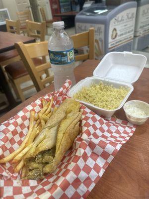 The chicken Shawarma sandwich, rice, fries