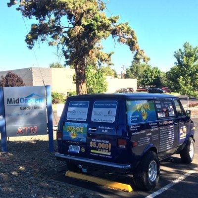 Olney branch sign with Mid Oregon van wrapped for 2020 Duck Race.