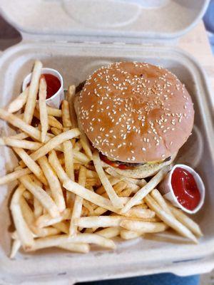 Double cheeseburger and fries made simply with mayo and ketchup