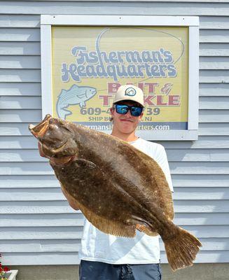 Store staffer Grey caught this 7# fluke on a Gulp Grub fishing a local reef site off LBI. Stop in for quality fluke fishing advise & tackle.