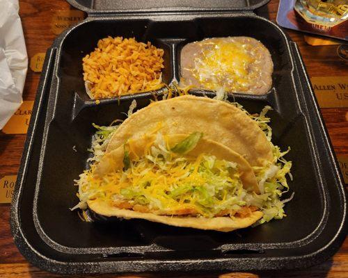 $16 for 2-tacos with scant rice & beans, chicken tacos were flavorless, taco shells were greasy