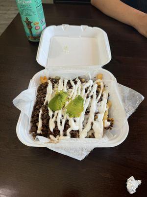 Asada fries with 2 ends of avocado