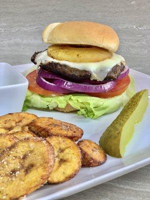 Jerk burger served with a side of plantain