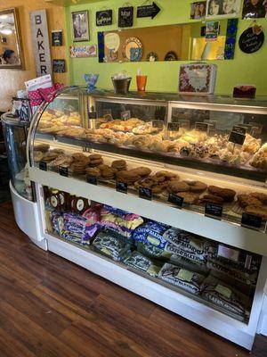 Bakery display with cookies, turnovers, pinwheels, elephant ears, and cream filled horns