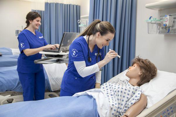 Vocational Nurse students practice on real-world patient skills.