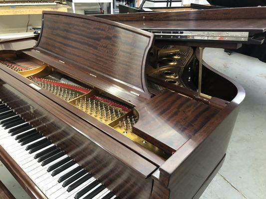 Quarter sawn mahogany piano refinishing done and headed back to the customer