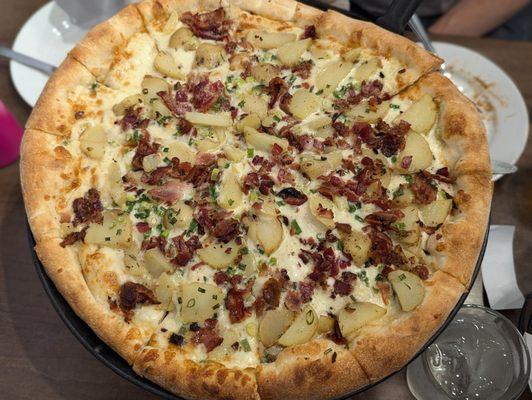 Yukon roasted potato and bacon pizza