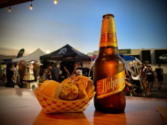 Best seat on the street for Oktoberfest. Got my brat and a Bohemia. Very smooth n tasty brew.