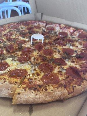 Pepperoni and sausage pizza