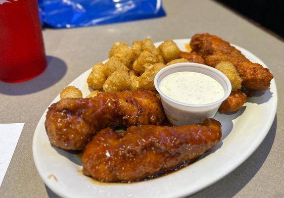 Boneless 4 pc with tots (Mango habanero, medium buffalo sauce). Mango is my new favorite