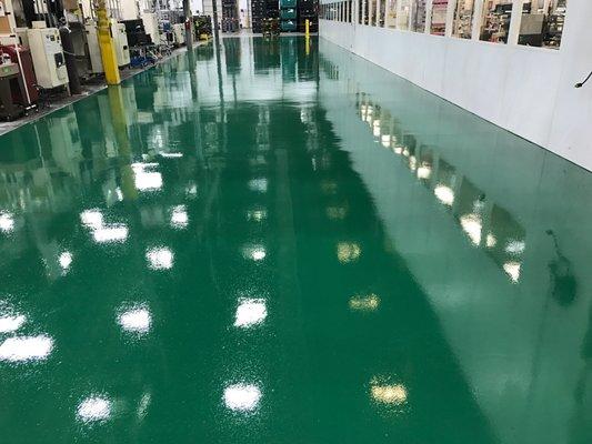 Industrial Floor Coatings: Apex installed this epoxy slurry and urethane finish coat on this factory in Dyersburg TN for a 3yr warranty.